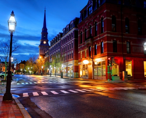 Downtown Portsmouth image of the city block at dusk
